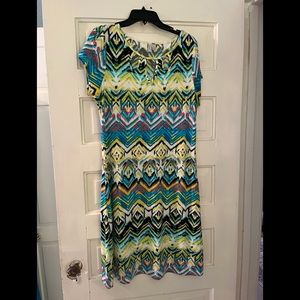 Madison size large dress with cute cutouts at neckline. Fun to wear!